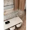 Detale szklanych kryształów lampy, które podkreślają jej wyjątkowość. Oświetlenie na zamówienie od Primavera Home.