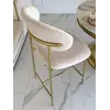 NOWOŚCI -- Hoker w stylu włoskim beżowy złoty nowoczesny desing JULIA w otoczeniu stylowych dodatków. Meble na zamówienie od Primavera Home.