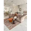 Aranzacja z sofą designerską Lilia, doskonale wpisująca się w stylowe wnętrze, dostępna w Primavera Home.