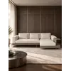 Sofa narożna z półką z bliskiego ujęcia, ukazująca detale wykonania i tkaniny od Primavera Home.