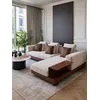 Sofa narożna z półką, nowoczesny narożnik, do salonu NAPOLEONE w ujęciu z przodu. Oświetlenie na zamówienie od Primavera Home.