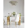 Widok za stołem glamour MILANO, ukazujący jego mamigającą elegancję w jadalni. Meble na zamówienie od Primavera Home.