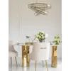 Szeroki plan na stół glamour MILANO, który jest centralnym punktem jadalni. Ekspozycja w salonie Primavera Home.
