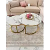 Detal wykończenia stolika kawowego okrągłego glamour MARCO GOLD, prezentujący harmonię złota i białego marmuru. Meble na zamówienie od Primavera Home.