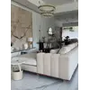 Salonowa perspektywa z stolikiem kawowym w centrum, ukazująca przestrzeń od Primavera Home.