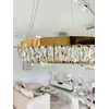 Zbliżenie na złote akcenty Żyrandola Kryształowego Bellini. Detal wykończenia od Primavera Home.