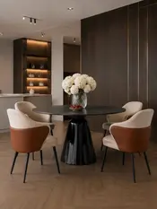 Okrągły Stół do Jadalni Oslo Spiekany kamień czarny Carrara i Stal Premium widziany z perspektywy. Ekspozycja w salonie od Primavera Home.
