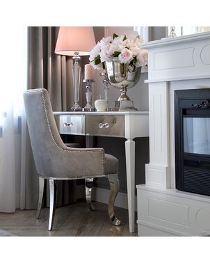 Upholstered chair upholstered on steel flexible legs to the salon TIFFANY silver