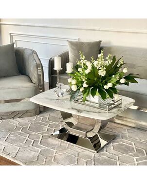 Glamorous coffee table for the living room with a white marble top, silver ART DECO