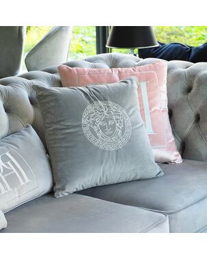 Decorative gray velvet pillow with Medusa logo