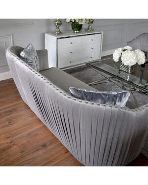 Elegant New York Chic pleated sofa in grey
