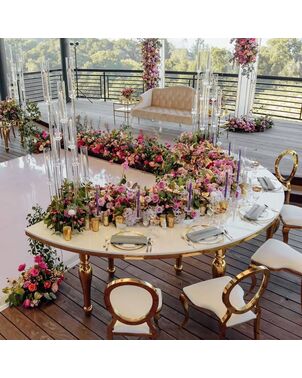 An exclusive banquet table for a wedding hall, hotel, restaurant, golden white top