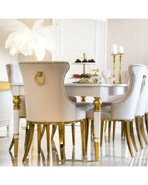 Modern, upholstered glamor chair for the dining room, with a simple steel frame, quilted, with a knocker, comfortable, golden GRETA