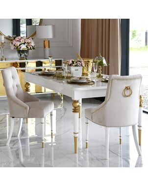Modern, golden PRINCE glamor chair with a knocker for the dining room