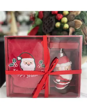 Soap dispenser in the shape of Santa Claus with a towel included
