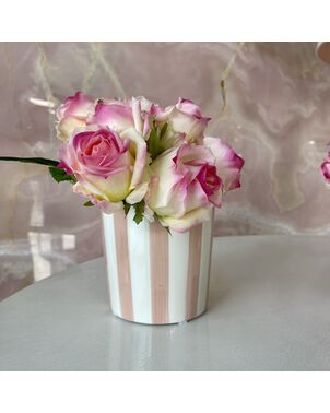 Pink ceramic flowerpot with stripes