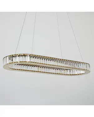 Glamorous gold crystal chandelier above the table, oblong CRYSTAL