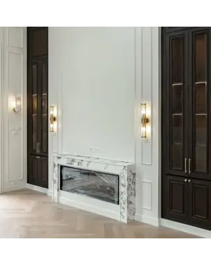 Detal wykończenia kinkietu kryształowego Roland w kolorze złotym. Projekt od Primavera Home.