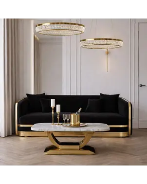 złota sofa czarna tapicerowana