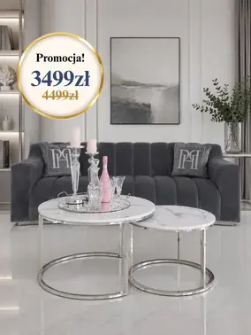 Perspektywa na okrągły stolik kawowy srebrny z marmurowym blatem 2w1, ukazująca jego nowoczesny design. Aranżacja nowoczesnego wnętrza od Primavera Home.