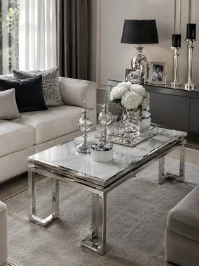 Stolik kawowy w stylu nowojorskim i glamour stal nierdzewna blat biały marmur OSKAR SILVER OUTLET 2 widoczny z boku. Meble na zamówienie od Primavera Home.