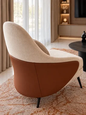 Designerski Fotel Linea z Podnóżkiem – Nowoczesny i Tapicerowany w perspektywie z tyłu. Ekspozycja w salonie od Primavera Home.