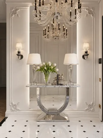 Konsola w stylu nowoczesnym glamour z białym marmurowym blatem srebrna ART DECO w zbliżeniu na nogi, pokazując kunszt i materiał użyty do produkcji. Meble na zamówienie od Primavera Home.