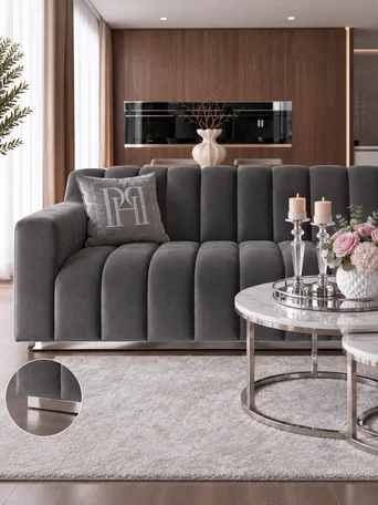 Perspektywiczne ujęcie sofy LONDON Nowoczesna, podkreślające jej nowoczesny design. Detal wykończenia od Primavera Home.