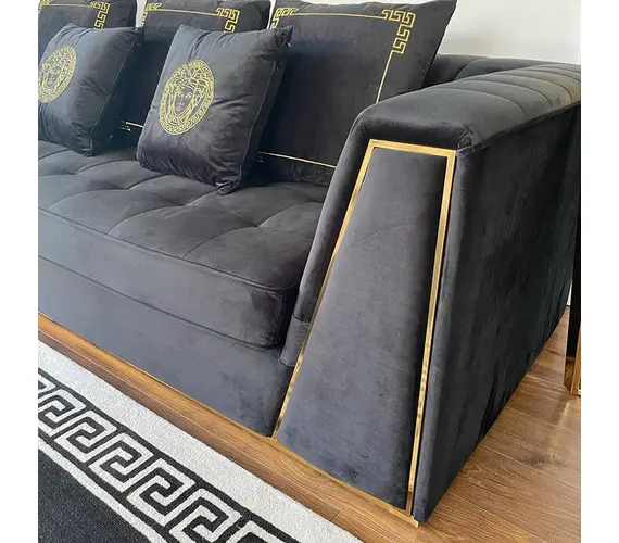 Black velvet quilted sofa, modern in a glamor style, for a golden living room MONTE CARLO