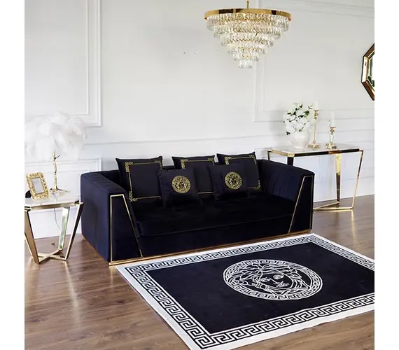 Black velvet quilted sofa, modern in a glamor style, for a golden living room MONTE CARLO