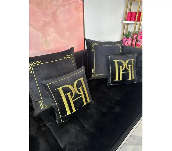 Black velvet quilted sofa, modern in a glamor style, for a golden living room MONTE CARLO