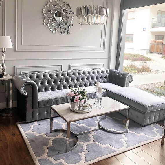 Chesterfield corner sofa with fold-out bedroom function, upholstered in glamour style