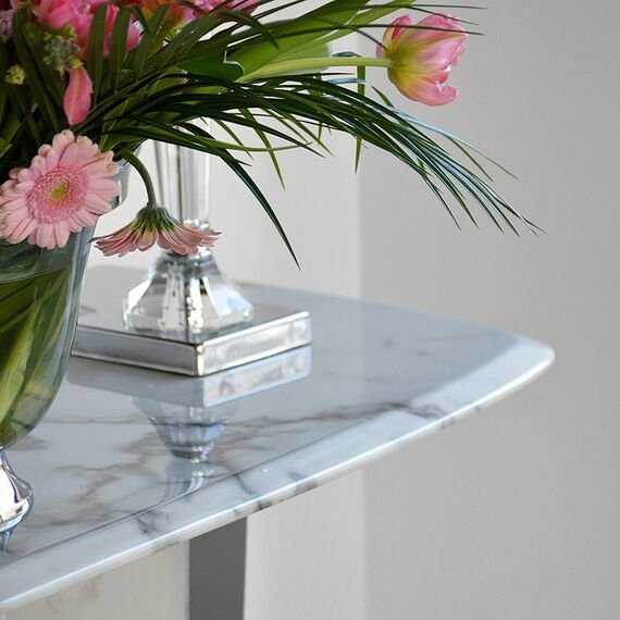 Glamor console in a modern style with a white marble top, silver ART DECO