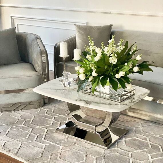 Glamorous coffee table for the living room with a white marble top, silver ART DECO