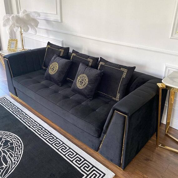 Black velvet quilted sofa, modern in a glamor style, for a golden living room MONTE CARLO