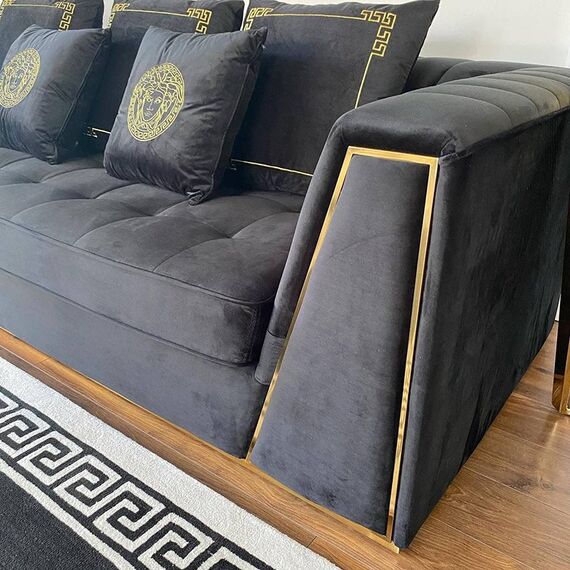 Black velvet quilted sofa, modern in a glamor style, for a golden living room MONTE CARLO