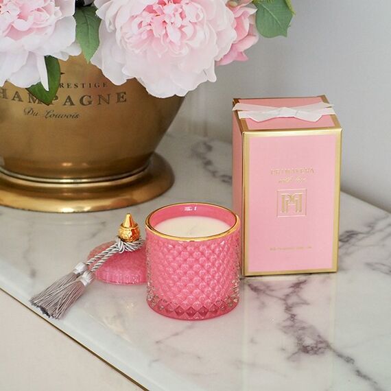 Decorative scented candle in a glass crystal container, rose gold