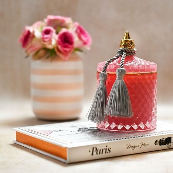 Decorative scented candle in a glass crystal container, rose gold