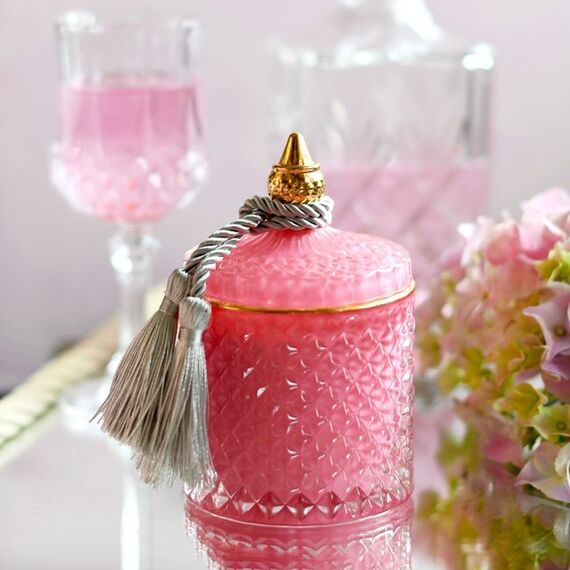 Decorative scented candle in a glass crystal container, rose gold