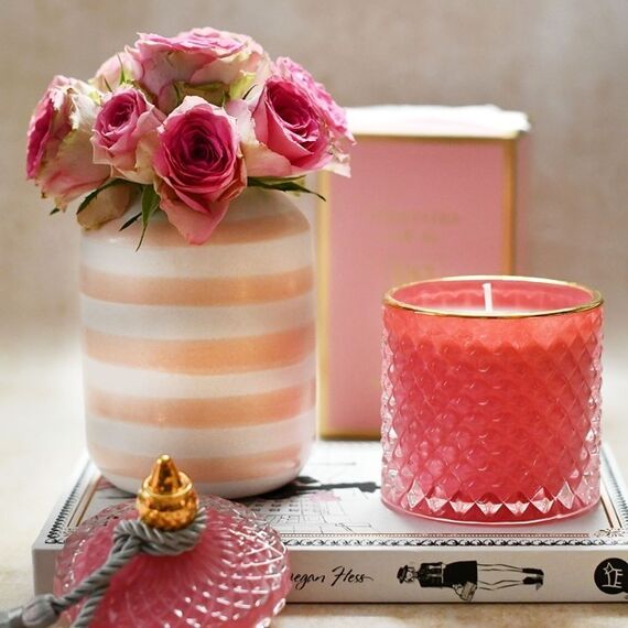 Decorative scented candle in a glass crystal container, rose gold