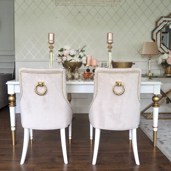Modern, golden PRINCE glamor chair with a knocker for the dining room