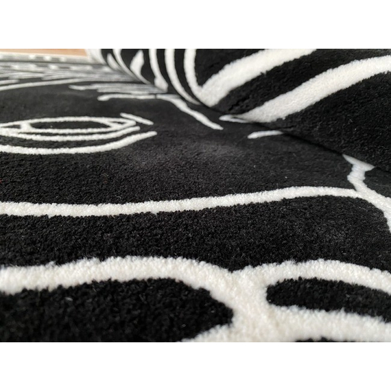 A modern black and white rug MEDUZA