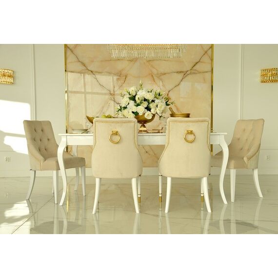 Modern, golden PRINCE glamor chair with a knocker for the dining room