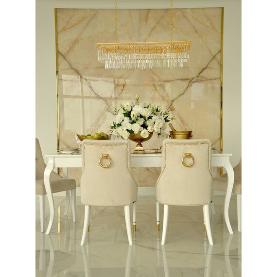 Modern, golden PRINCE glamor chair with a knocker for the dining room