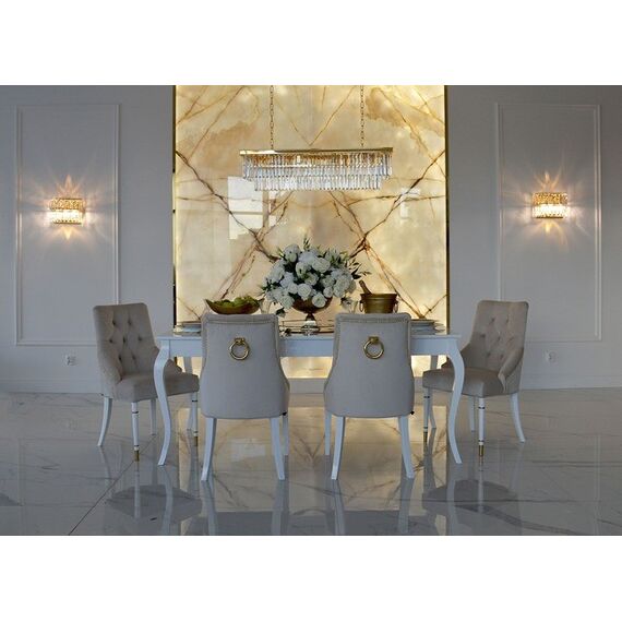 Modern, golden PRINCE glamor chair with a knocker for the dining room