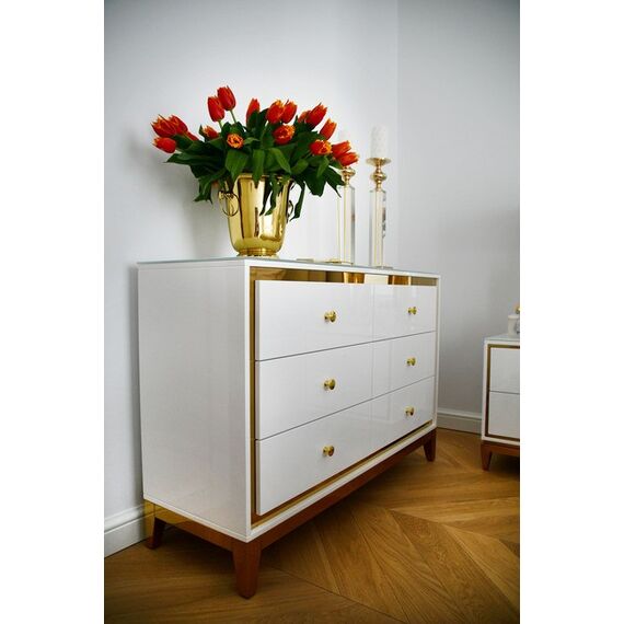 Lorenzo M Gold Glamour wooden lacquered chest of drawers with steel legs