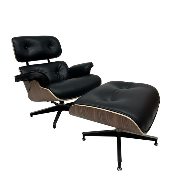 Exclusive, comfortable, modern black leather armchair with LOUNGE footstool