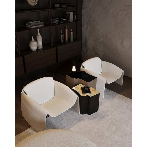 SPIDER, a modern, light beige designer leather armchair