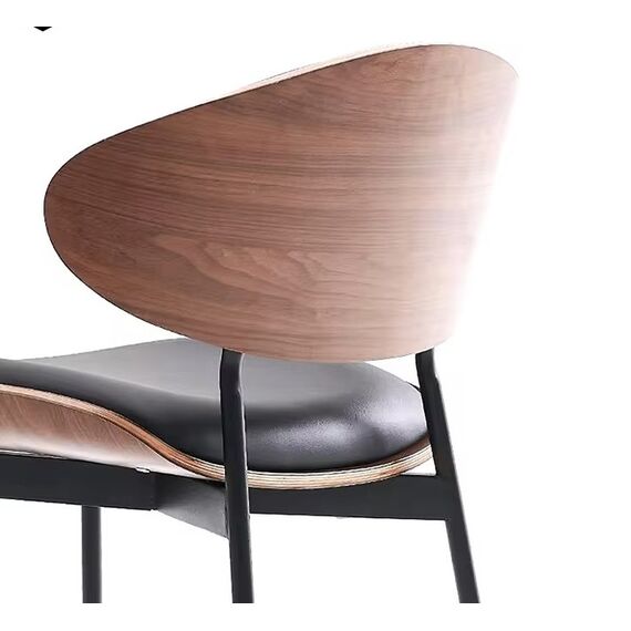 Modern designer wooden chair with a black WING frame