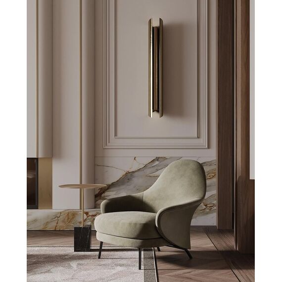 Modern, upholstered designer armchair on black legs with a LINEA footstool